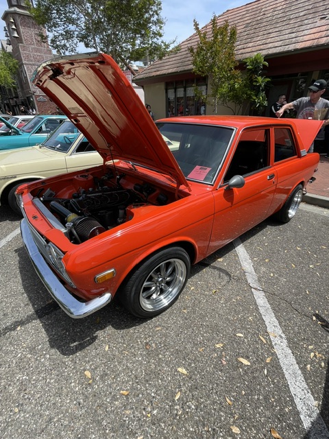 Datsuns lined up on First Street